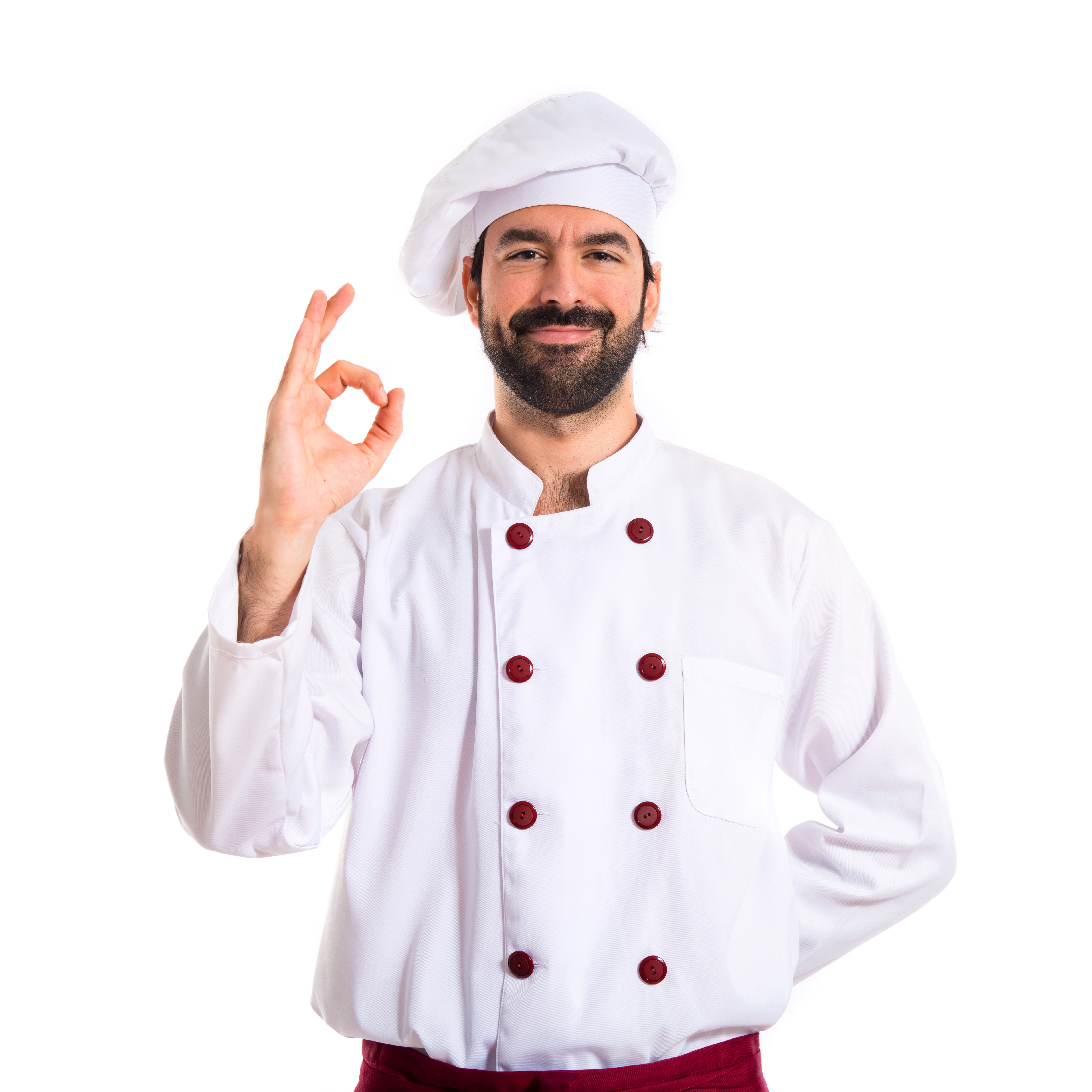 A chef pointing the triple fingers sign